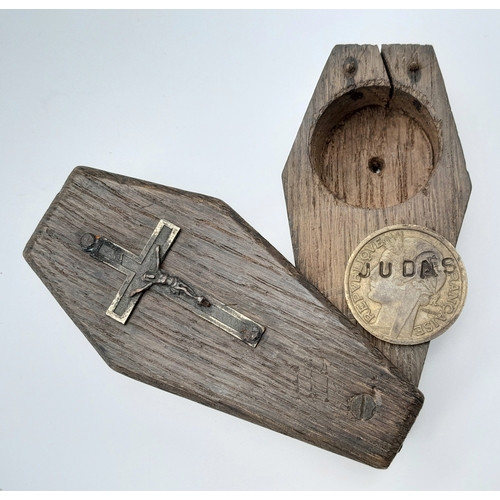 A WW2 French Resistance Warning Coffin with a 1941 dated 2 Franc coin stamped “JUDAS” This would have been left as a warning to someone who has given information to the Germans for money.