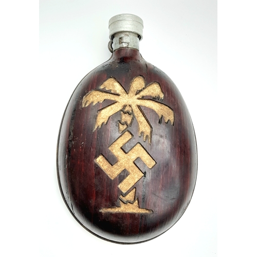 254 - A WW2 German Africa Corps Trench Art Husk Covered Water Bottle. This would have been done locally in... 