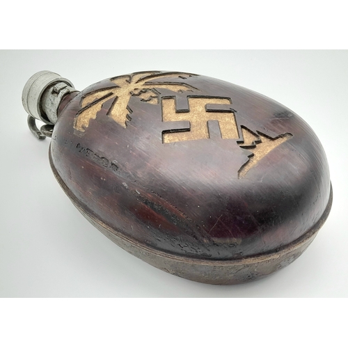 254 - A WW2 German Africa Corps Trench Art Husk Covered Water Bottle. This would have been done locally in... 