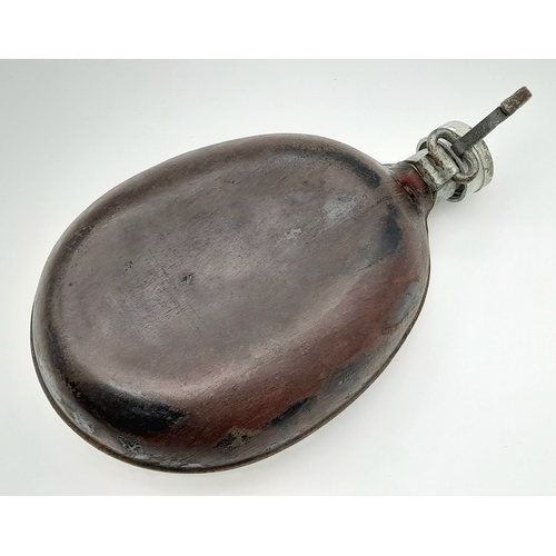 254 - A WW2 German Africa Corps Trench Art Husk Covered Water Bottle. This would have been done locally in... 