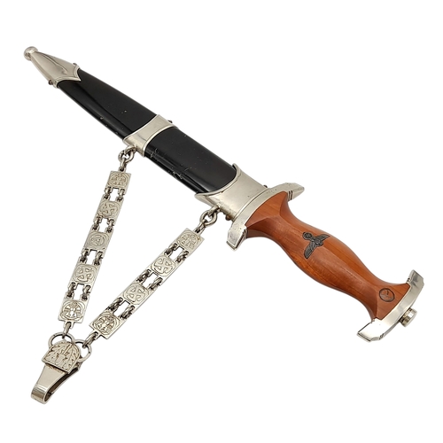 295 - A very desirable 3rd Reich NSKK Chained Officers Dagger. The blade has been kept greased and is in c... 