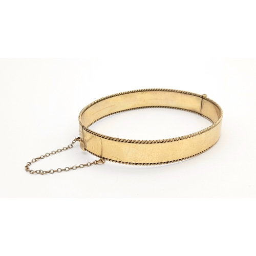 154 - Vintage 9 CARAT GOLD PLATED HINGED BANGLE. Complete with safety chain. Heavy GOLD PLATING (50 Micron... 