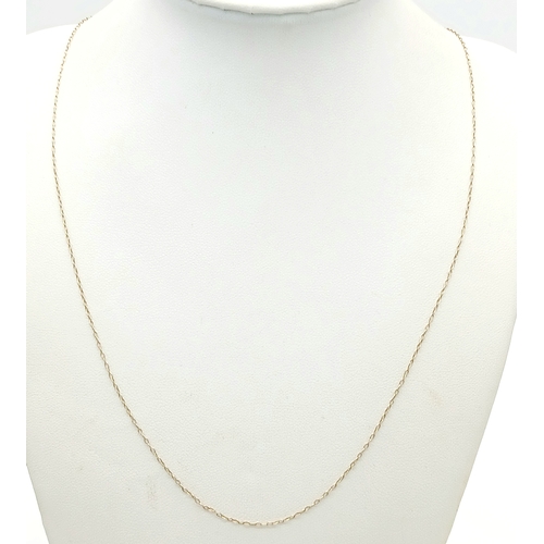 105 - Classic 9 CARAT GOLD FINE CHAIN NECKLACE. Long length at 55 cm. 1.08 grams. Please see pictures.