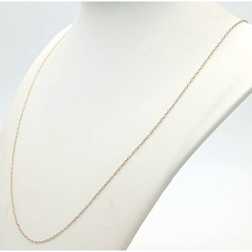 105 - Classic 9 CARAT GOLD FINE CHAIN NECKLACE. Long length at 55 cm. 1.08 grams. Please see pictures.