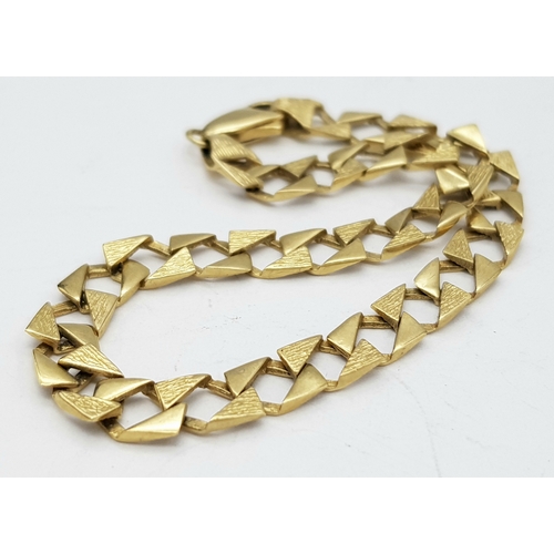 107 - A 9K Yellow Gold Square Link, Bark Effect Bracelet. 18cm. 5.5g.