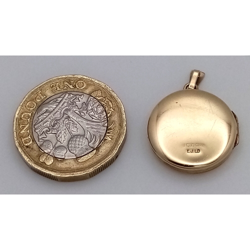 14 - Vintage 9 CARAT GOLD LOCKET. Circular form with full UK hallmark. 2.14 grams. 1.7 cm diameter.