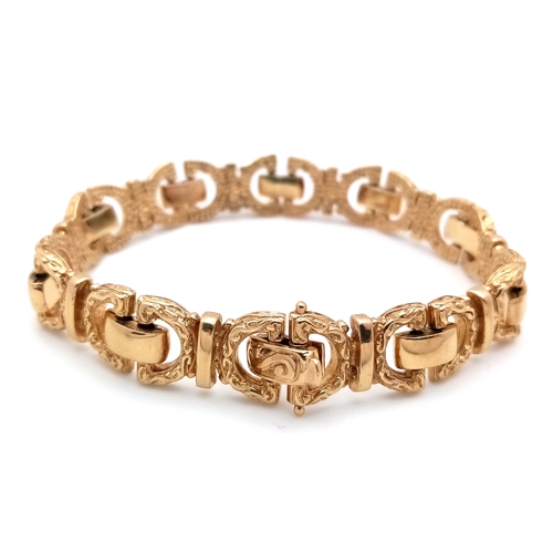 23 - A Beautifully Constructed 9K Gold Byzantine Style Bracelet. 18cm. 33.4g.