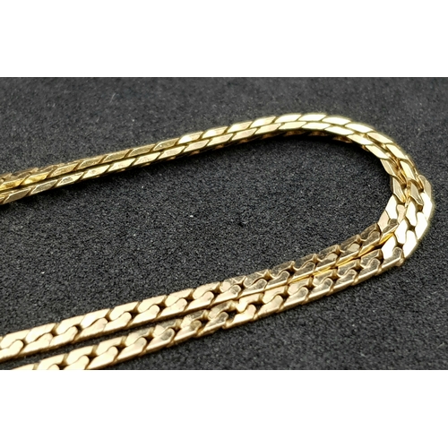 413 - Classic 9 CARAT GOLD  CHAIN NECKLACE. Flat and slim curb chain style. Approx 3.2 grams. 50 cm. (20”)... 