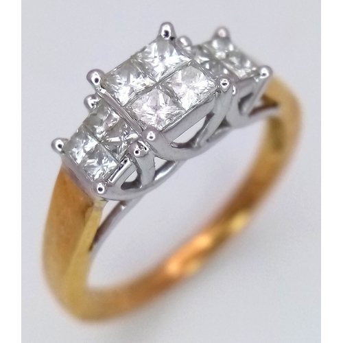 242 - AN 18K GOLD DIAMOND RING HAVING 12 SQUARE CUT DIAMONDS OF .60ctw .         3.8gms    size L . Ref: 2... 