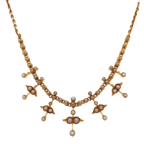 121 - An Antique 15K Gold (tested) Seed Pearl Floral Necklace. A gold link chain gives way to hanging seed... 