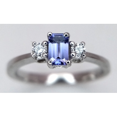 134 - AN 18K WHITE GOLD DIAMOND & TANZANITE THREE STONE RING 2.8G TOTAL WEIGHT, SIZE L. REF: A/S 1234