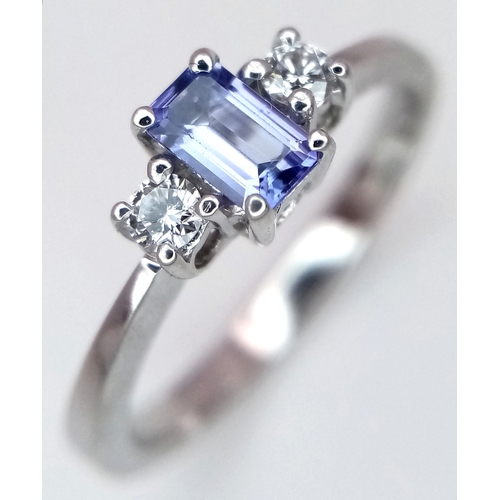 134 - AN 18K WHITE GOLD DIAMOND & TANZANITE THREE STONE RING 2.8G TOTAL WEIGHT, SIZE L. REF: A/S 1234