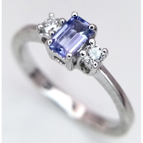 134 - AN 18K WHITE GOLD DIAMOND & TANZANITE THREE STONE RING 2.8G TOTAL WEIGHT, SIZE L. REF: A/S 1234