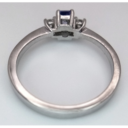 134 - AN 18K WHITE GOLD DIAMOND & TANZANITE THREE STONE RING 2.8G TOTAL WEIGHT, SIZE L. REF: A/S 1234