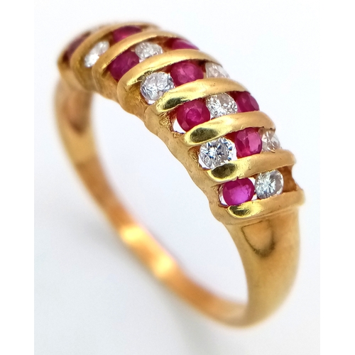 177 - AN 18K YELLOW GOLD DIAMOND & RUBY RING - 0.20CTW. 3.3G. SIZE T. SC5098.