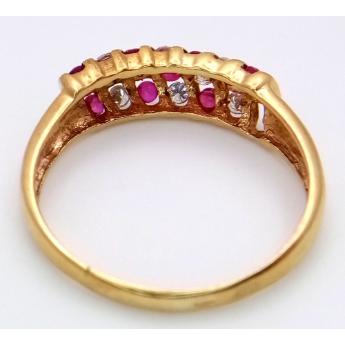 177 - AN 18K YELLOW GOLD DIAMOND & RUBY RING - 0.20CTW. 3.3G. SIZE T. SC5098.