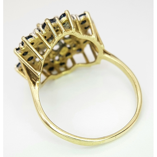 230 - A 9K YELLOW GOLD DIAMOND & SAPPHIRE SET CLUSTER RING. 5G. SIZE U. SC5037.