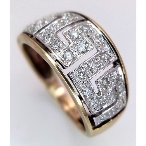 412 - A 9K YELLOW GOLD GREEK KEY DESIGN DIAMOND RING. 3.2G. SIZE O. SC5064.