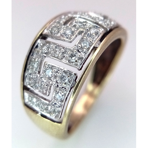 412 - A 9K YELLOW GOLD GREEK KEY DESIGN DIAMOND RING. 3.2G. SIZE O. SC5064.