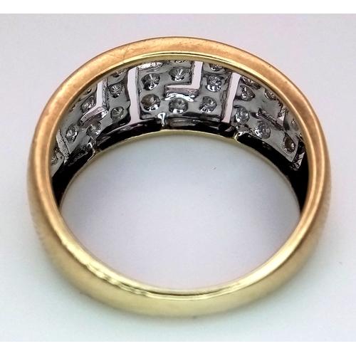 412 - A 9K YELLOW GOLD GREEK KEY DESIGN DIAMOND RING. 3.2G. SIZE O. SC5064.