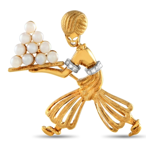 1186 - An 18K Yellow Gold Pearl Genie Brooch. In excellent condition and presented in a gift box. Total wei... 