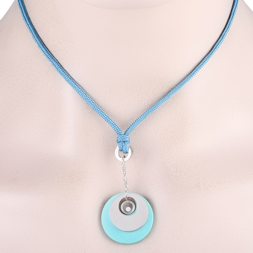 1311 - A Chopard Happy Diamonds 18K White Gold Diamond and Turquoise Pendant Necklace. features a blue silk... 