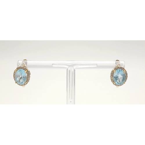 72 - A Pair of 14K Yellow Gold, Aquamarine and White Zircon Earrings. 4.08g.