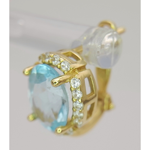 72 - A Pair of 14K Yellow Gold, Aquamarine and White Zircon Earrings. 4.08g.