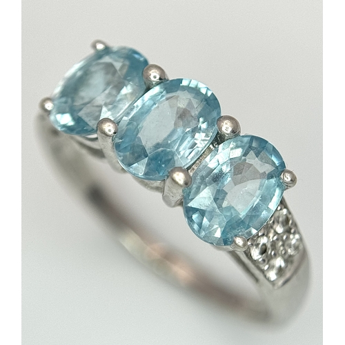 93 - A 9K White Gold Blue and White Stone Ring. Size N. 3.3g