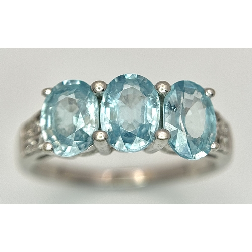 93 - A 9K White Gold Blue and White Stone Ring. Size N. 3.3g