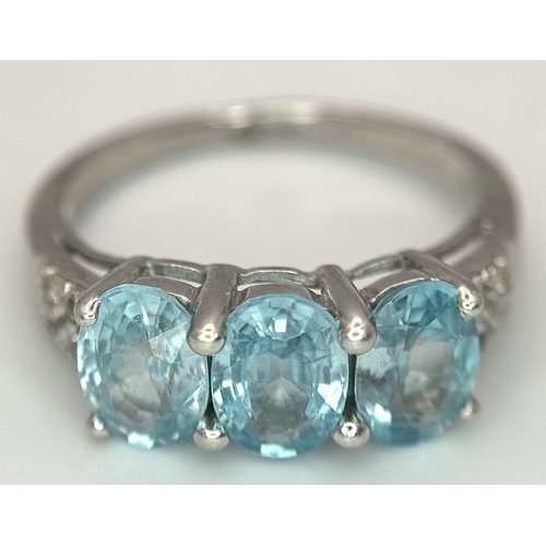 93 - A 9K White Gold Blue and White Stone Ring. Size N. 3.3g