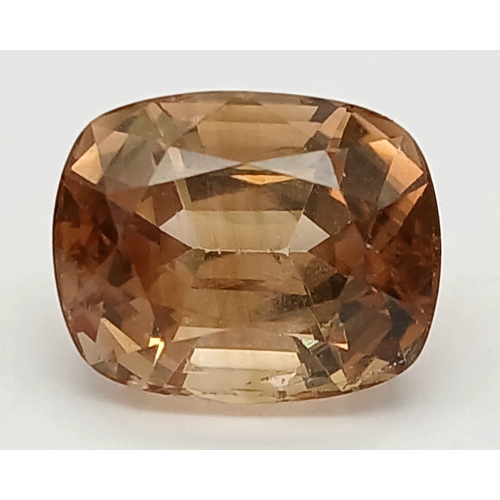 1298 - A 15.9ct Cushion Cut Imperial Topaz. Orange/brown. Pakistan origin. Comes with a GFCO Swiss certific... 