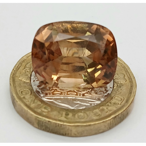 1298 - A 15.9ct Cushion Cut Imperial Topaz. Orange/brown. Pakistan origin. Comes with a GFCO Swiss certific... 