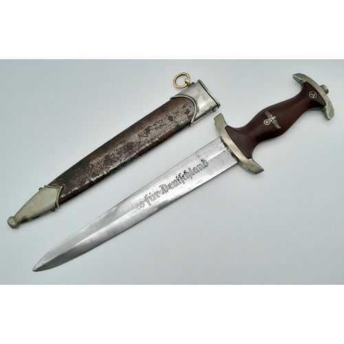 1373 - An Early WWII Third Reich SA dagger by Maker Carl Wusthof. Cherry red mahogany grip. Marks on blade ... 