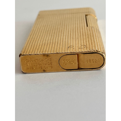 119 - Genuine vintage MADISON CARAN D’ACHE of GENEVA 18ct Gold Plated LIGHTER. Having ribbed design with h... 