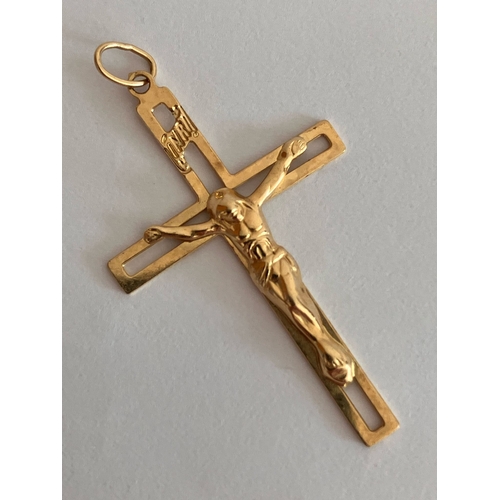 217 - Beautiful 14 CARAT GOLD CRUCIFIX /CROSS PENDANT. Modern Design. 0.6 grams.