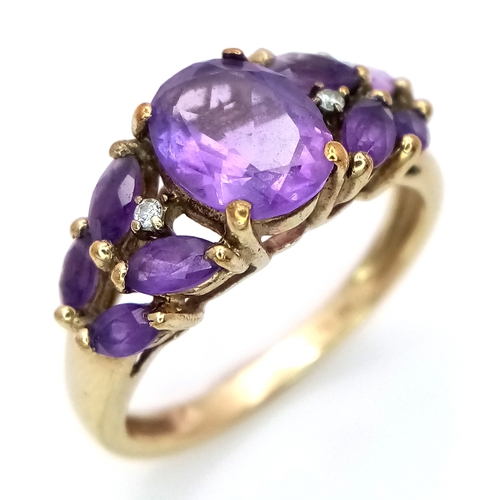 51 - A 9K Yellow Gold, Amethyst and Diamond Ring. Size L. 3.37g