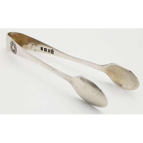 1688 - An antique pair of sterling silver sugar tongs. Full Birmingham hallmarks, 1907. Total weight 12.7G.... 