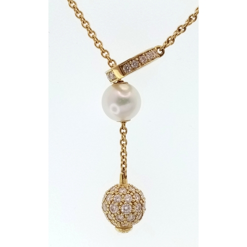 87 - An Italian 18K Gold and Pearl Necklace. A string of ten pearls lead to a gold and diamond circular c... 