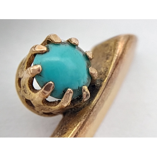 83 - An Antique 9K Rose Gold and Turquoise Wishbone brooch. Pin has been replaced. 4cm. 1.55g