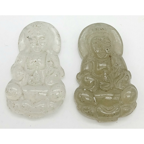 1209 - Two Clearstone Buddha Pendants. 4cm.