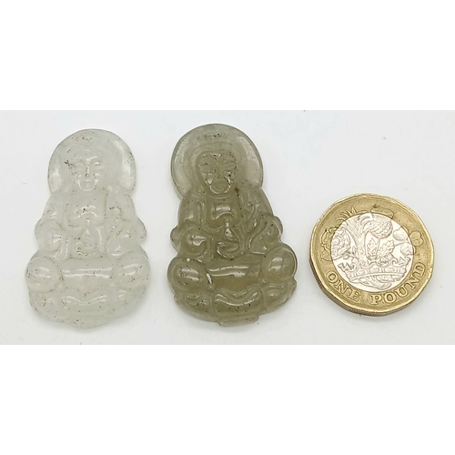 1209 - Two Clearstone Buddha Pendants. 4cm.