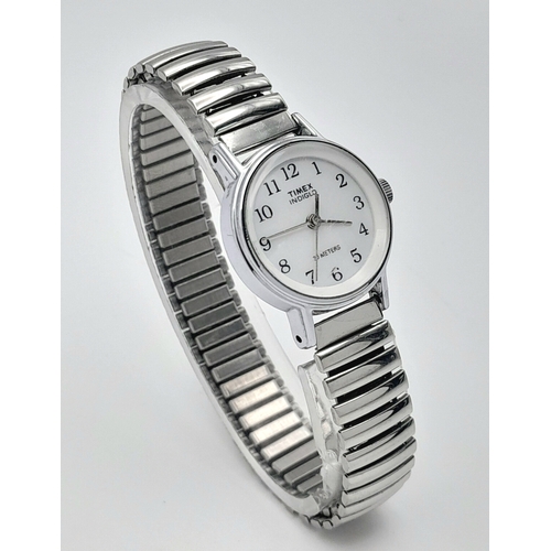 1309 - A Stylish Ladies Timex Indiglo Quartz Watch. 23mm Case. New Battery Fitted February 2025. Flex Brace... 