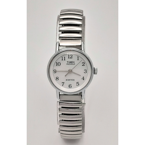 1309 - A Stylish Ladies Timex Indiglo Quartz Watch. 23mm Case. New Battery Fitted February 2025. Flex Brace... 