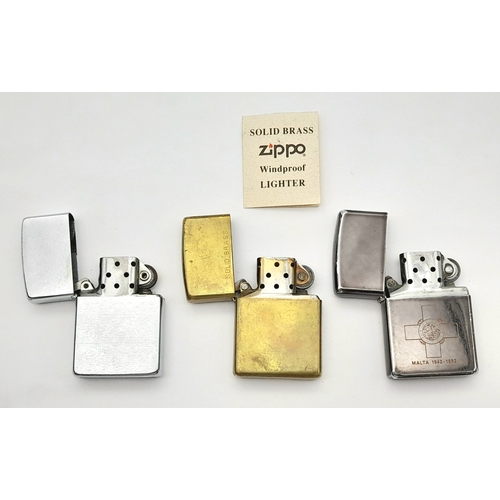 1190 - Three Vintage Zippo Lighters. One Brass and Two Silver Tone. One Engraved Malta 1942-92. One Early B... 