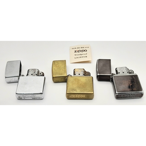 1190 - Three Vintage Zippo Lighters. One Brass and Two Silver Tone. One Engraved Malta 1942-92. One Early B... 