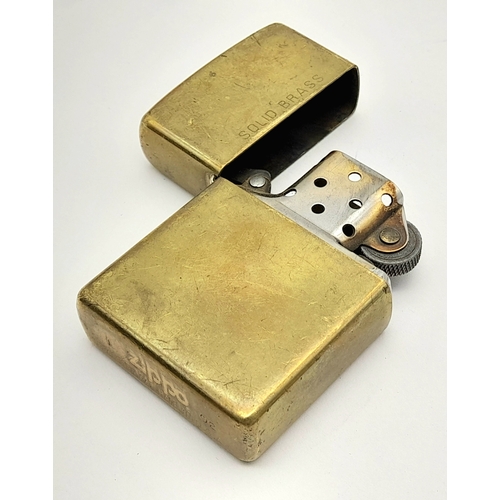 1190 - Three Vintage Zippo Lighters. One Brass and Two Silver Tone. One Engraved Malta 1942-92. One Early B... 