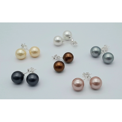 1300 - Six Pairs of South Sea Pearl Shell Stud Earrings.