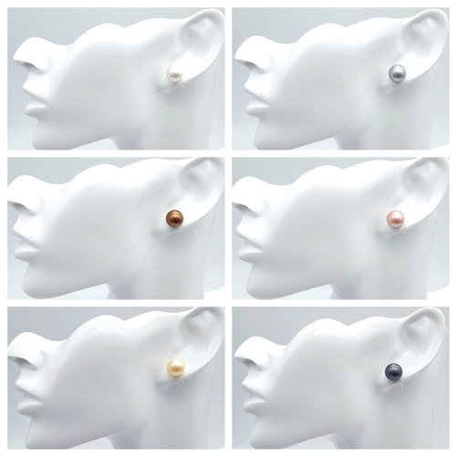 1300 - Six Pairs of South Sea Pearl Shell Stud Earrings.