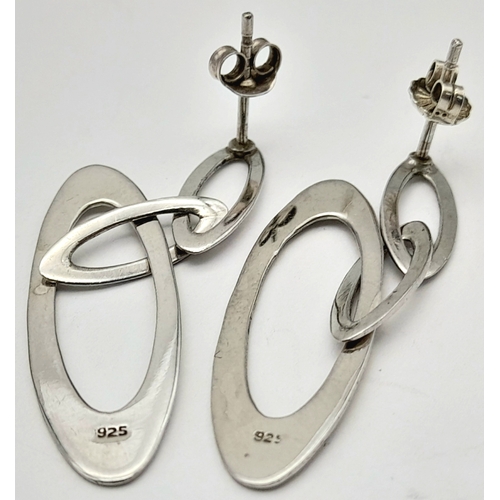 1633 - A Pair of Silver Oval Drop Earrings. 4cm